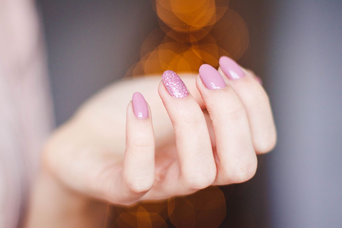 Pink gel manicure with glitter accent nail